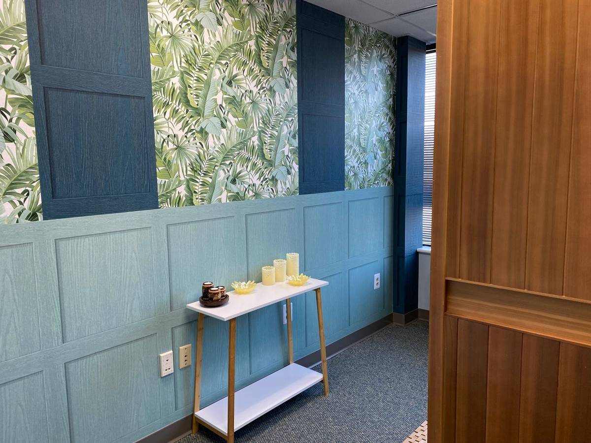 A peaceful consultation room hallway inside Be The Change.